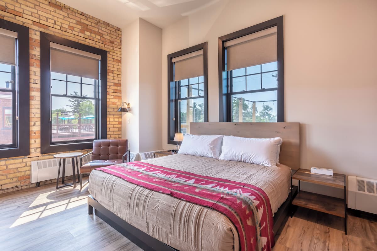 Room 10 @ 102 West Main Street | Premium bedding, individually decorated, individually furnished