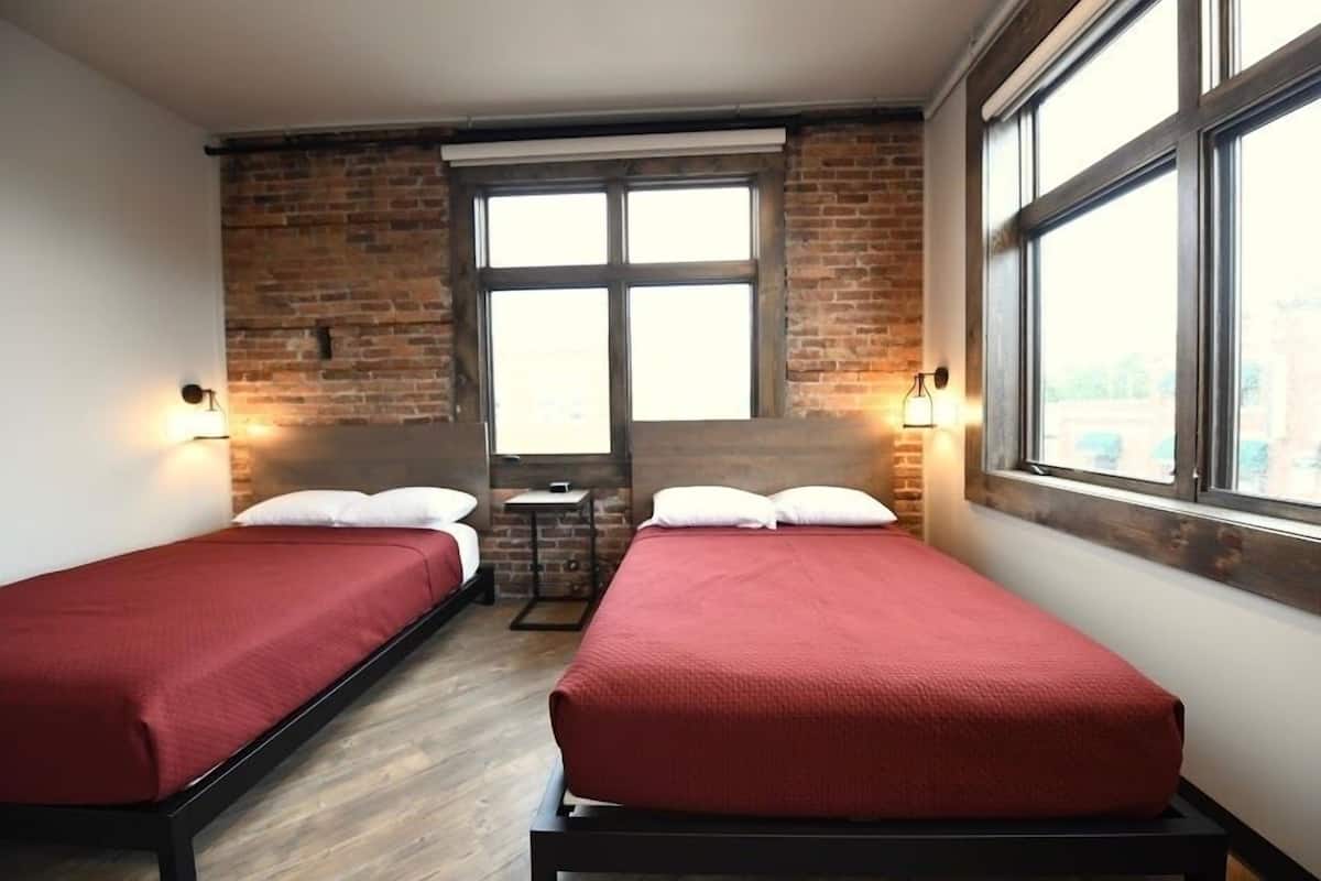 Room 4 @ 30 W Main Street | Premium bedding, individually decorated, individually furnished