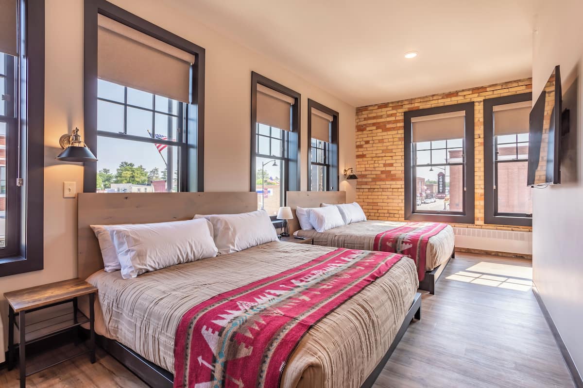 Room 16 @ 102 West Main Street | Premium bedding, individually decorated, individually furnished