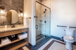 Room 16 @ 102 West Main Street | Bathroom | Shower, hair dryer, towels - Crosby Lofts (Crosby)