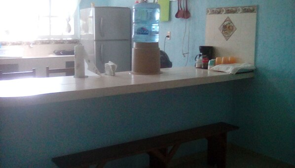 Fridge, stovetop, coffee/tea maker, blender