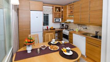 Fridge, microwave, cookware/dishes/utensils