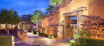 UpScale Resort with Outdoor Heated Pool with a waterslide and a poolside bar, tennis court and gym