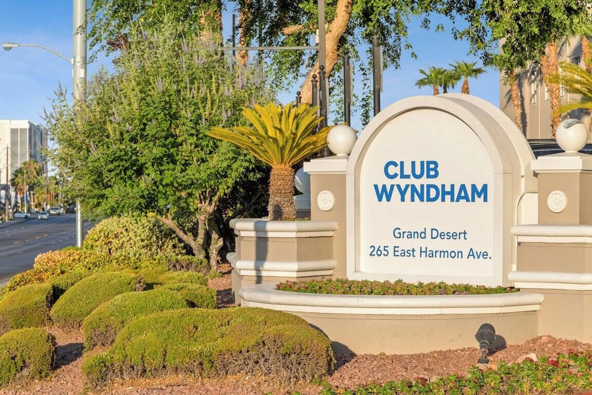 A sign for CLUB WYNDHAM at 265 East Harmon Ave.