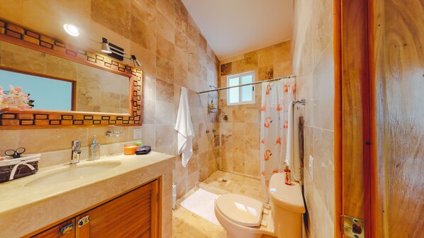 A bathroom with a sink, mirror, shower, and toilet. - Casa Gilruja in Las Moradas 3BD House for rent in Amapas, Puerto vallarta (Puerto Vallarta)
