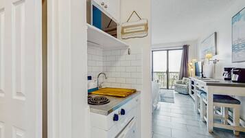 Fridge, microwave, stovetop, coffee/tea maker