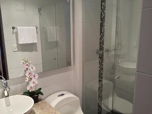 Shower, hair dryer, towels, soap
