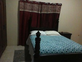 Comfort Room, 1 Queen Bed | Blackout drapes, iron/ironing board, bed sheets