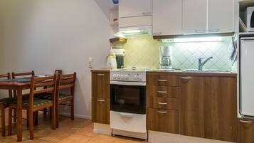 Fridge, microwave, high chair, cookware/dishes/utensils