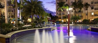 Relax at our Palm Tree secluded Resort with a poolside bar and waterslide