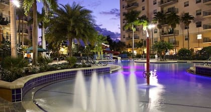 Relax at our Palm Tree secluded Resort with a poolside bar and waterslide