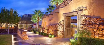 UpScale Resort with Outdoor Heated Pool with a waterslide and a poolside bar, tennis court and gym