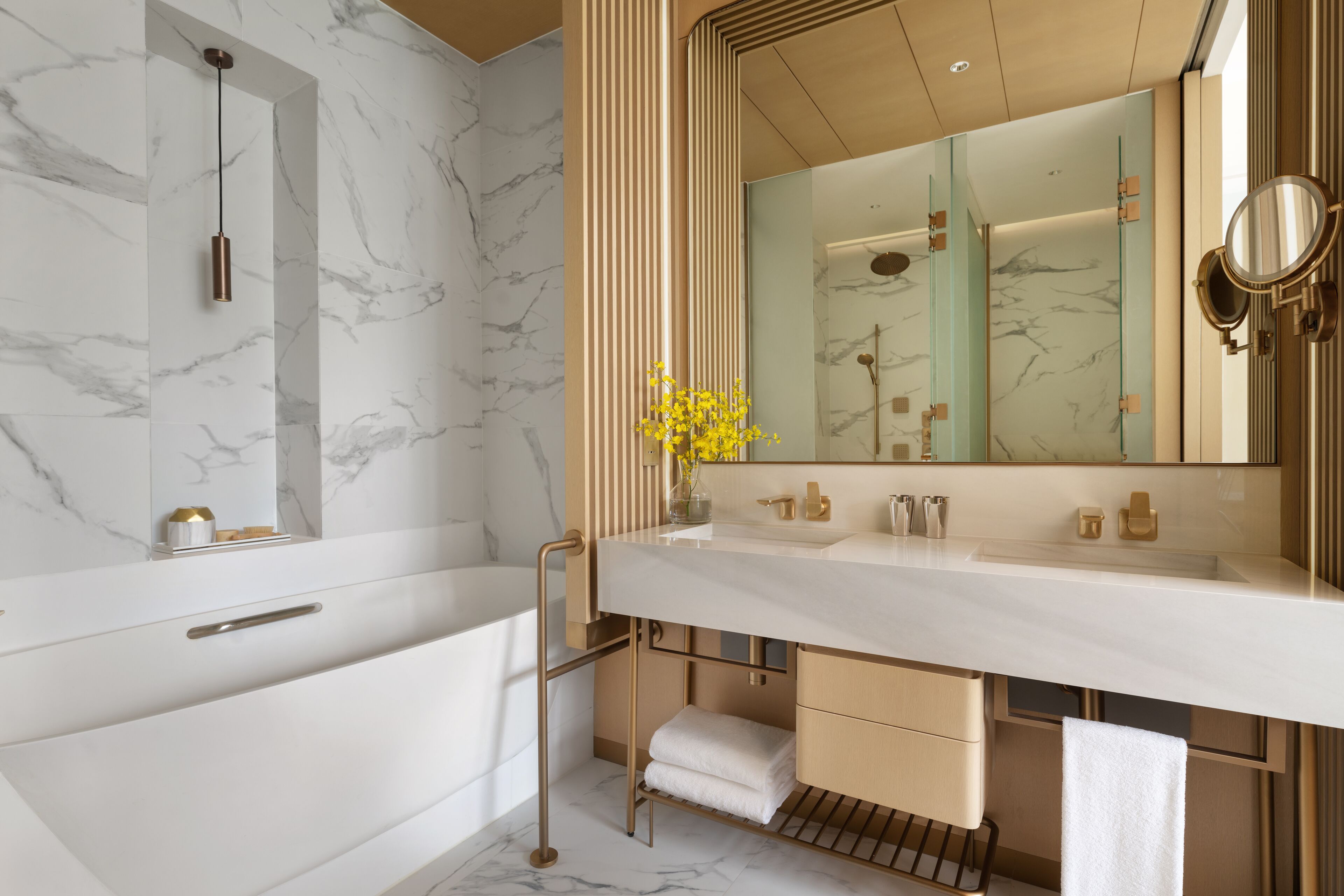 designer toiletries, hair dryer, bathrobes, slippers