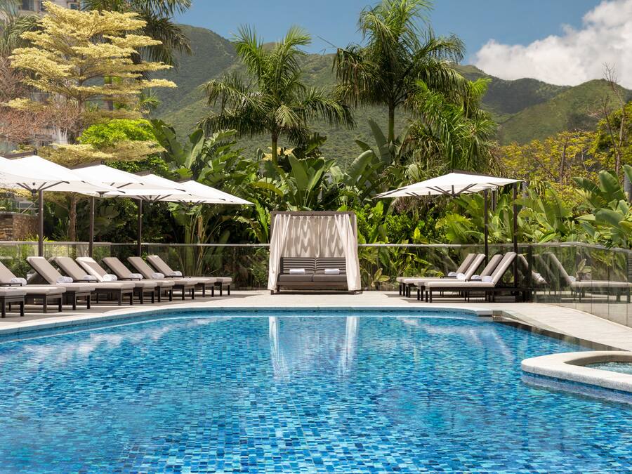 Seasonal outdoor pool, pool loungers