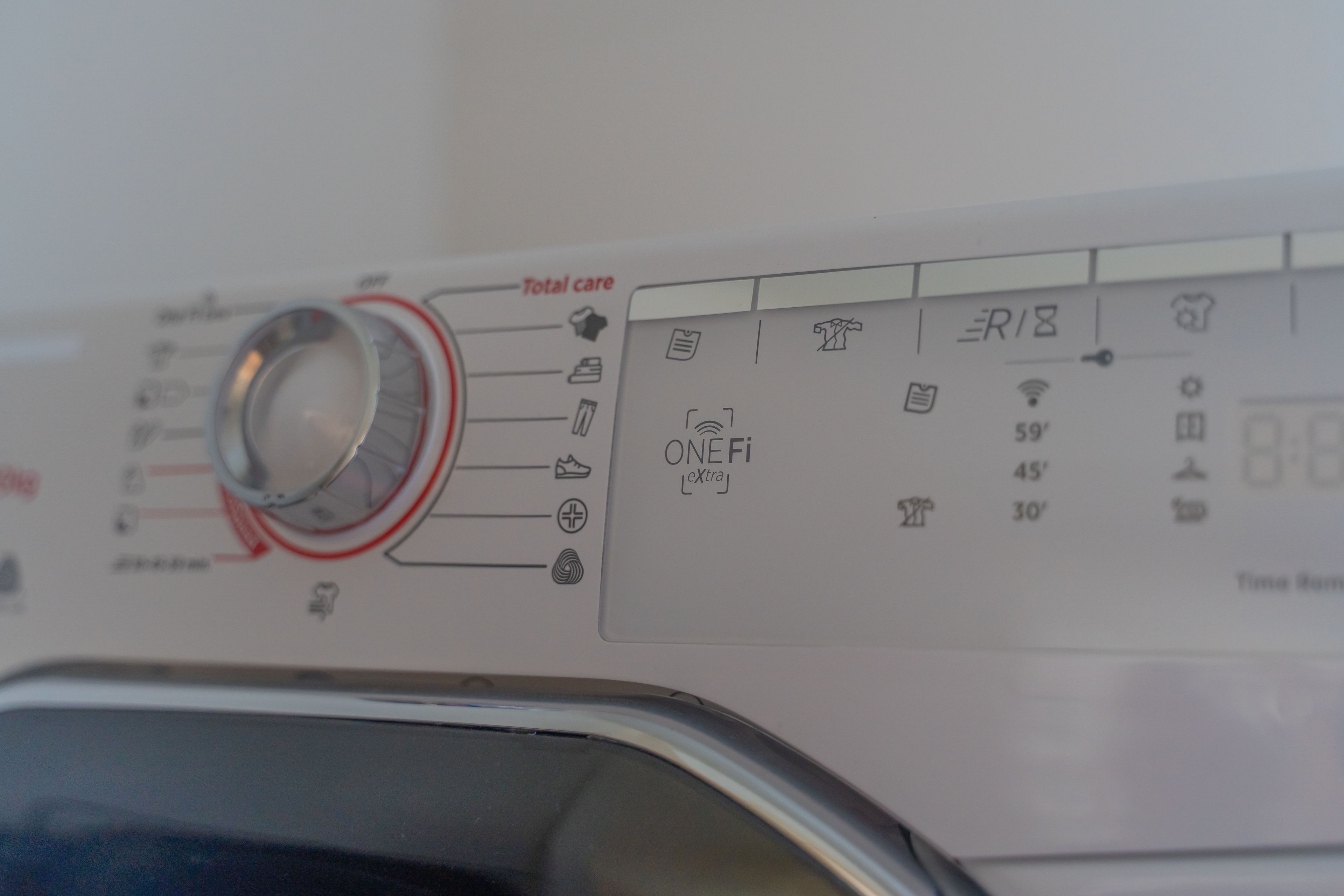 A control panel with various settings and indicators, including a dial, icons for different functions, and numerical values.