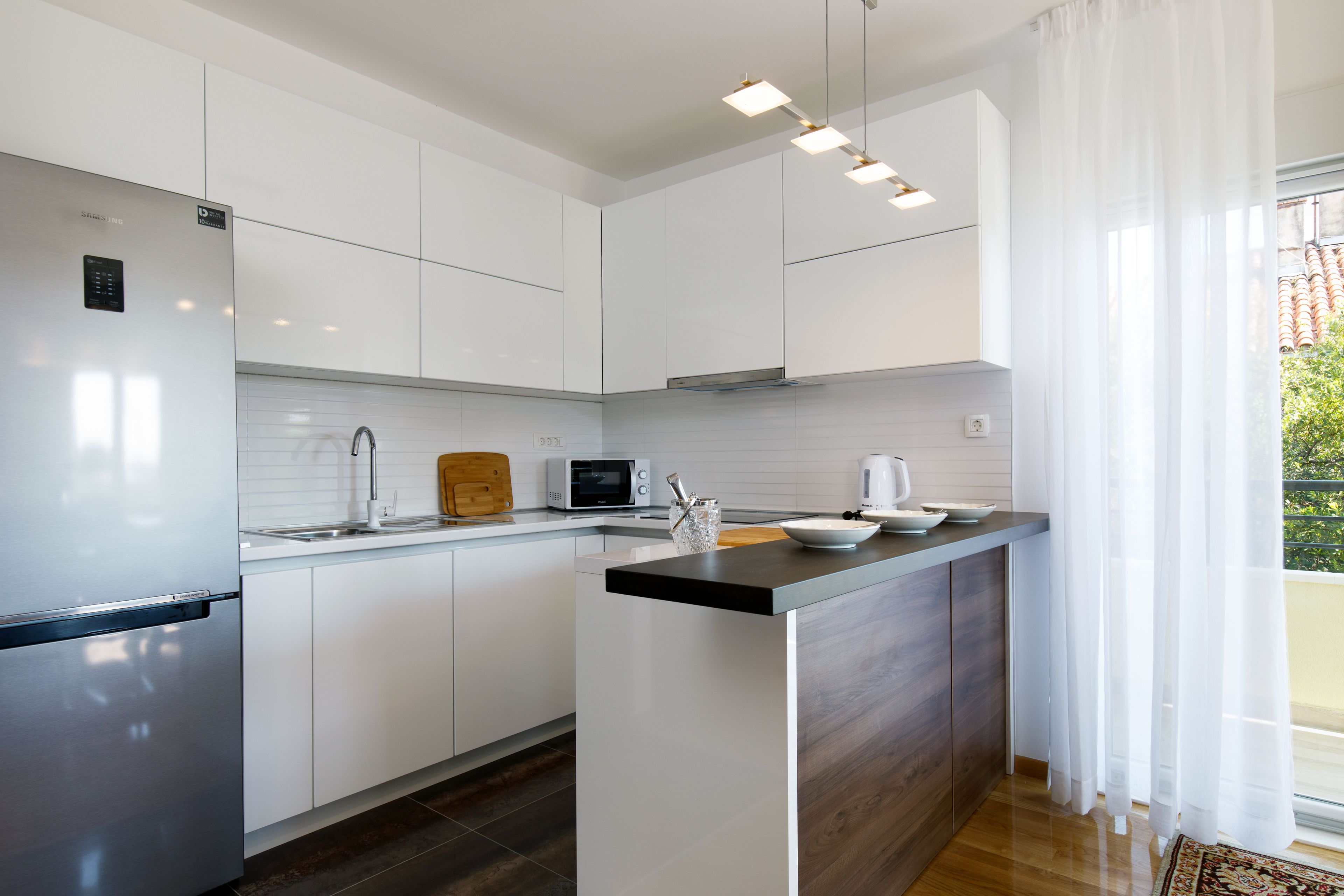 Apartment, 3 Bedrooms, Partial Ocean View | Private kitchen | Full-size fridge, microwave, oven, stovetop