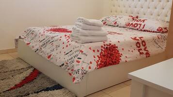 Blackout curtains, iron/ironing board, free WiFi, bed sheets