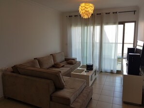 Luxury Apartment, Smoking, Sea View | Living room | 55-inch flat-screen TV with cable channels, TV - Delux apartment 50 meters from the beach (Ashkelon)
