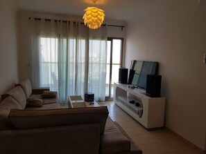 Luxury Apartment, Smoking, Sea View | Living area | 55-inch flat-screen TV with cable channels, TV - Delux apartment 50 meters from the beach (Ashkelon)