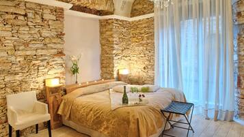 Deluxe Double Room | Minibar, in-room safe, individually decorated, individually furnished