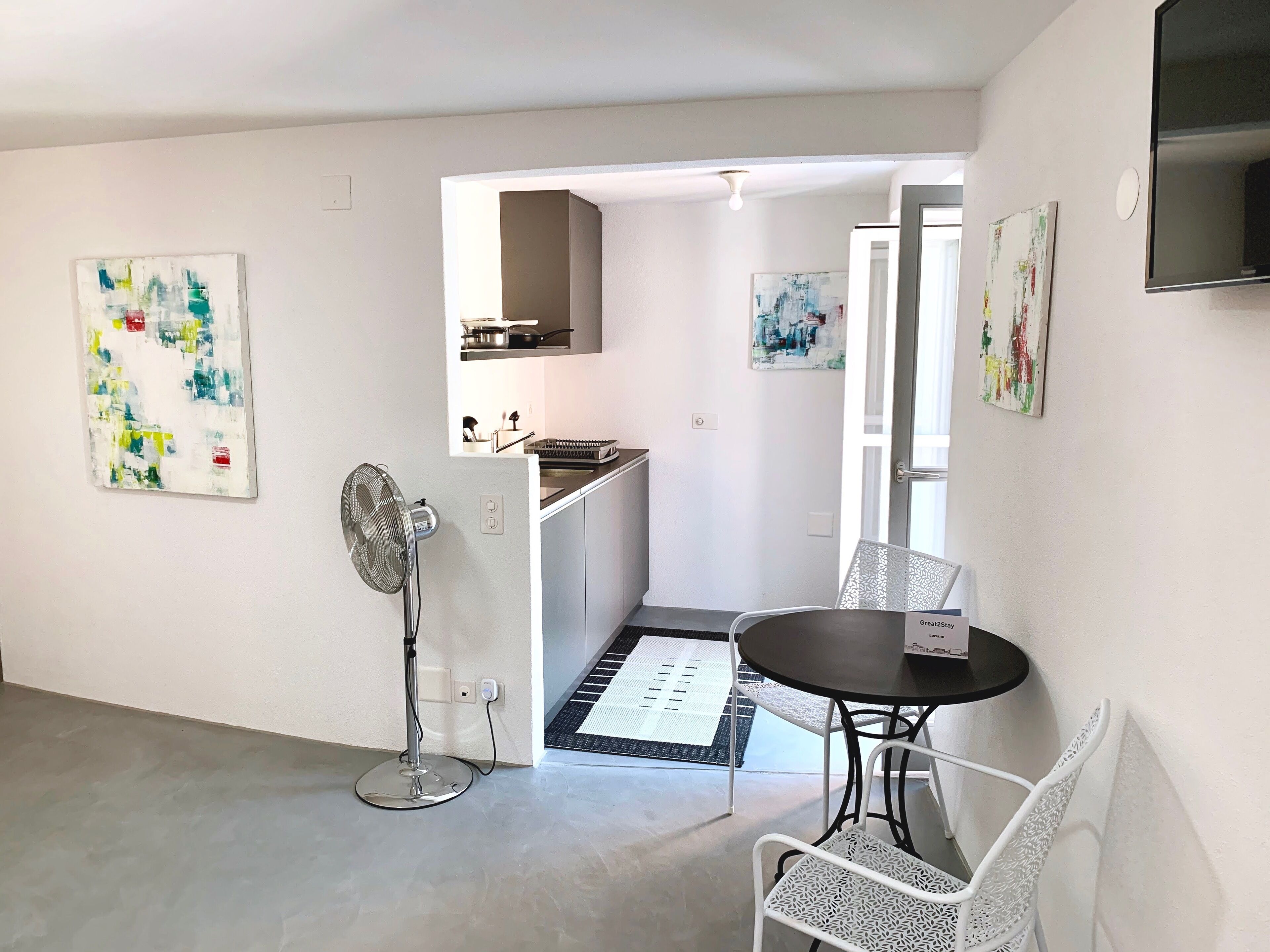 Appartamento Design, 1 letto queen | Area soggiorno | TV a schermo piatto