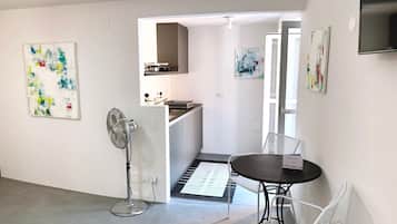 Appartamento Design, 1 letto queen | Area soggiorno | TV a schermo piatto