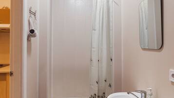 Shower, free toiletries, hair dryer, slippers