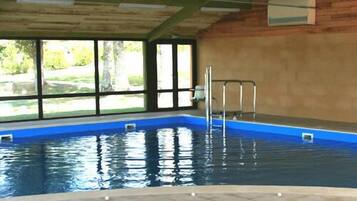 Indoor pool, seasonal outdoor pool, pool loungers