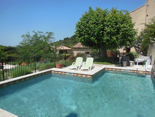 Seasonal outdoor pool, pool umbrellas, sun loungers