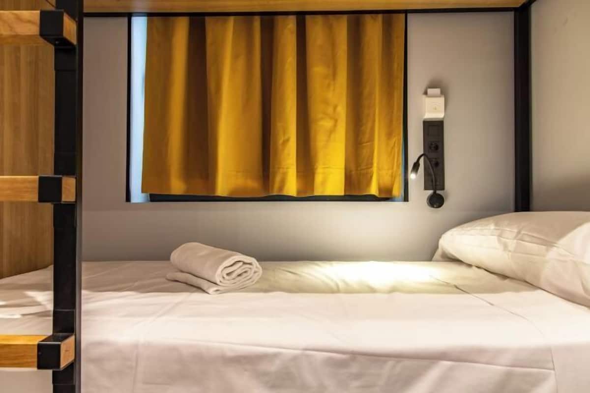 Cortinas blackout, quartos à prova de som, Wi-Fi de cortesia