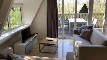 Superior Chalet | Living area | Flat-screen TV