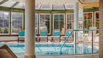 Indoor pool, outdoor pool, open 7:00 AM to 7:00 PM, sun loungers