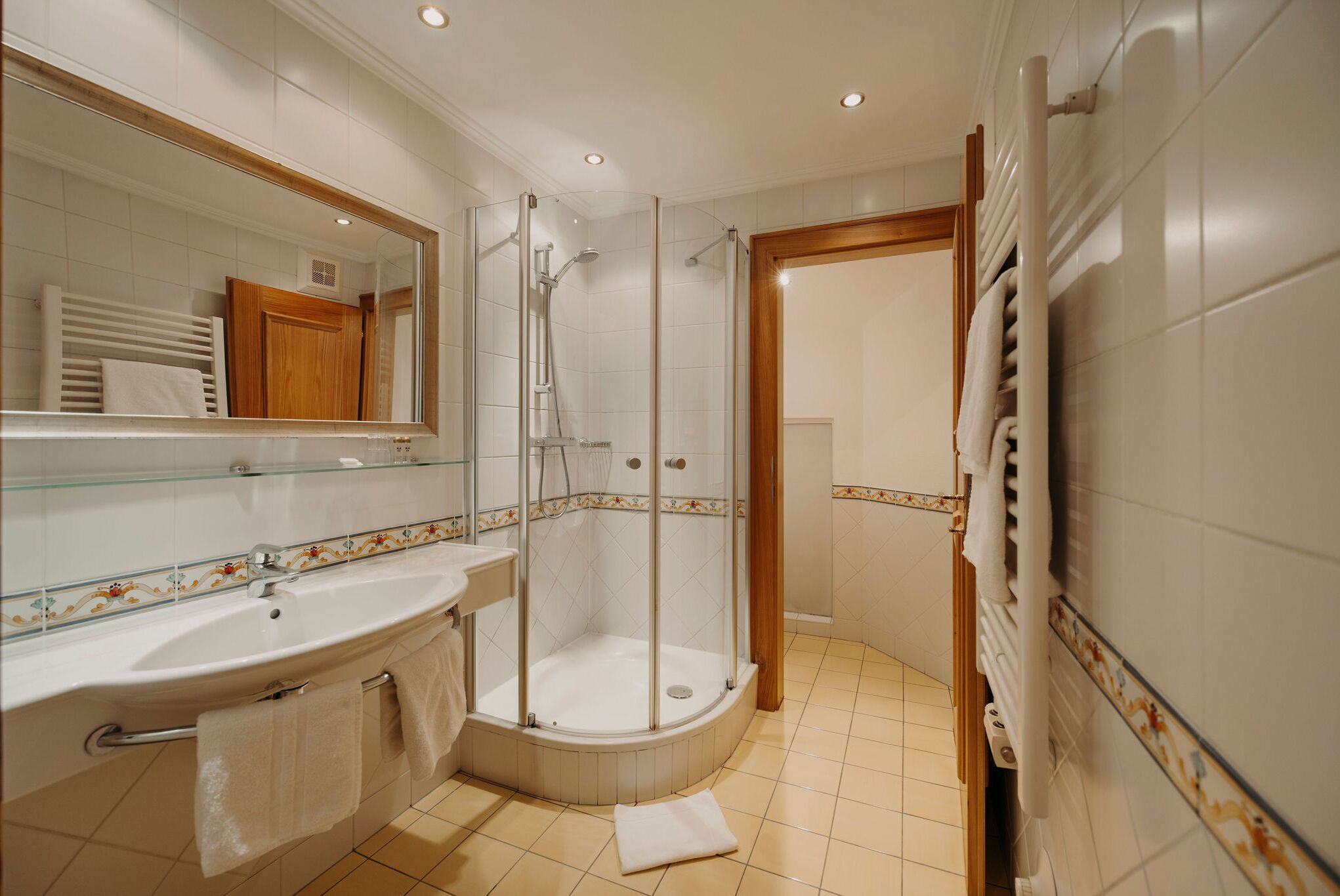 shower, hair dryer, bathrobes, towels