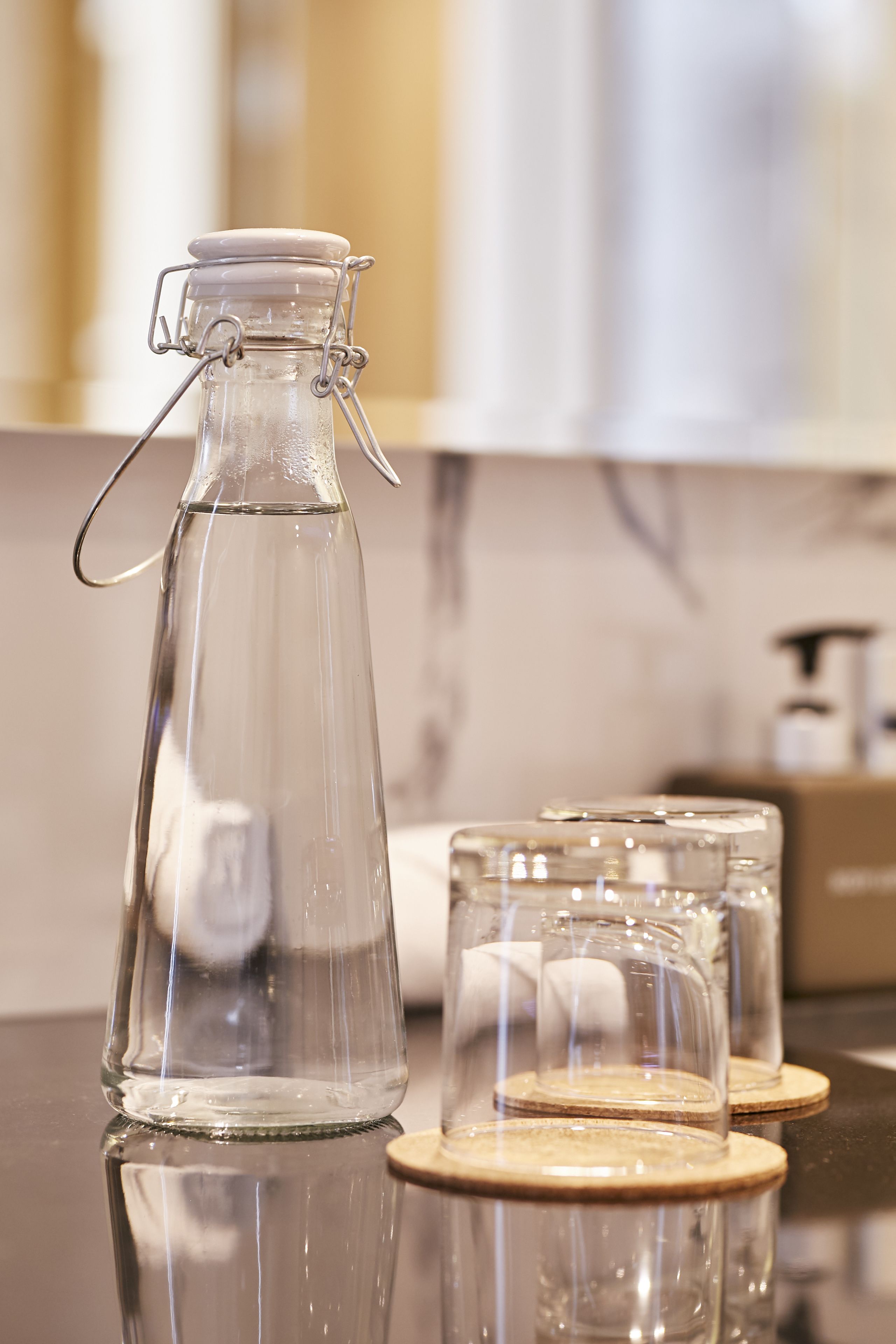 designer toiletries, hair dryer, bathrobes, slippers