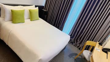 Premium bedding, down duvets, minibar, in-room safe