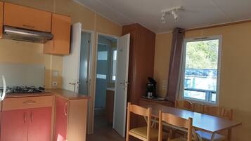Mobile Home, 2 Bedrooms | Private kitchen | Full-size fridge, microwave, stovetop, coffee/tea maker