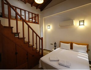 Blackout drapes, iron/ironing board, free WiFi, bed sheets