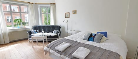 Doppelzimmer, Gemeinschaftsbad | 1 Schlafzimmer, individuell dekoriert, individuell eingerichtet