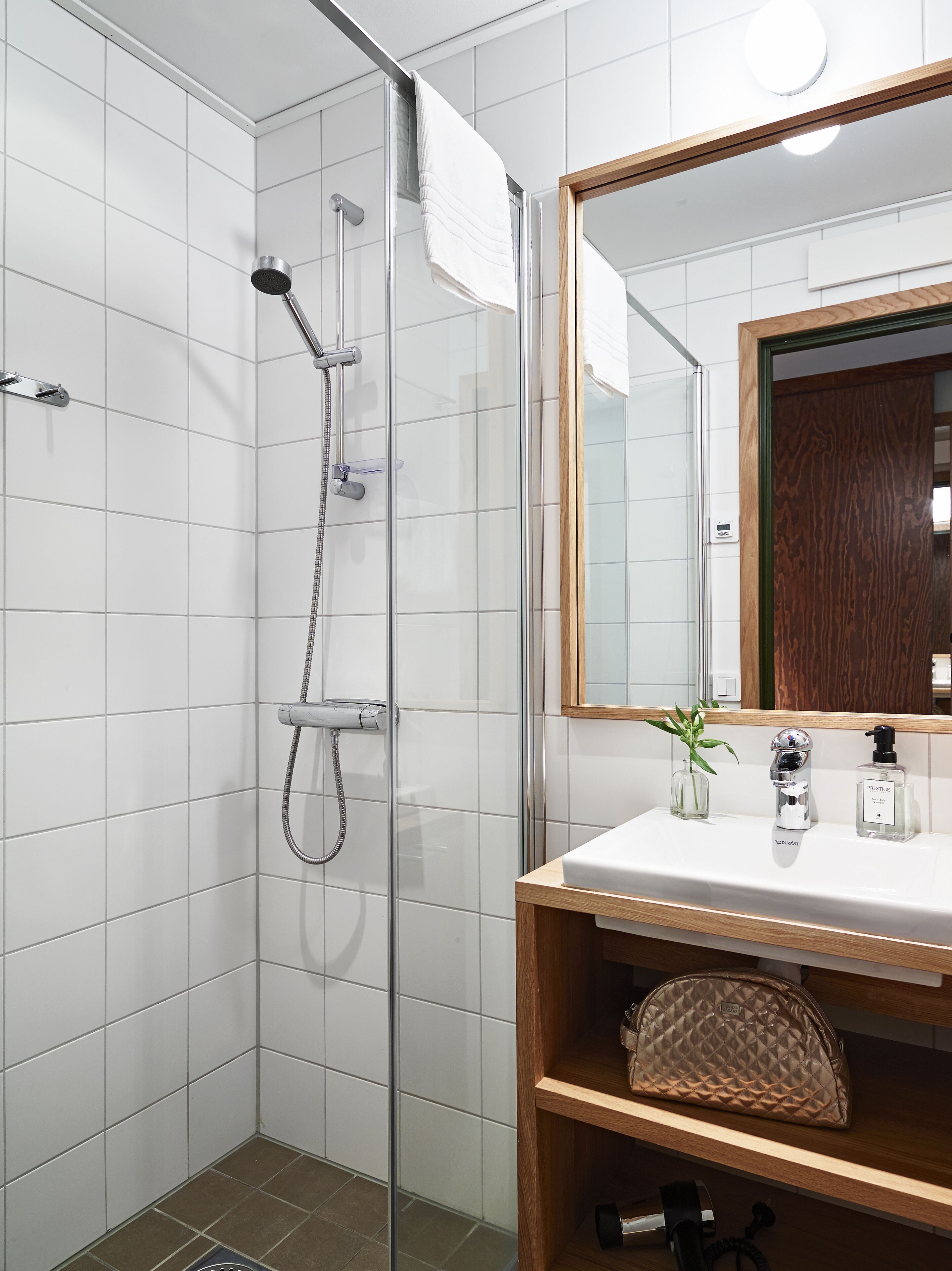 shower, eco-friendly toiletries, hair dryer, towels