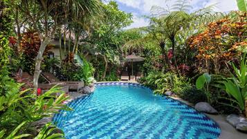 Outdoor pool, free cabanas, pool umbrellas