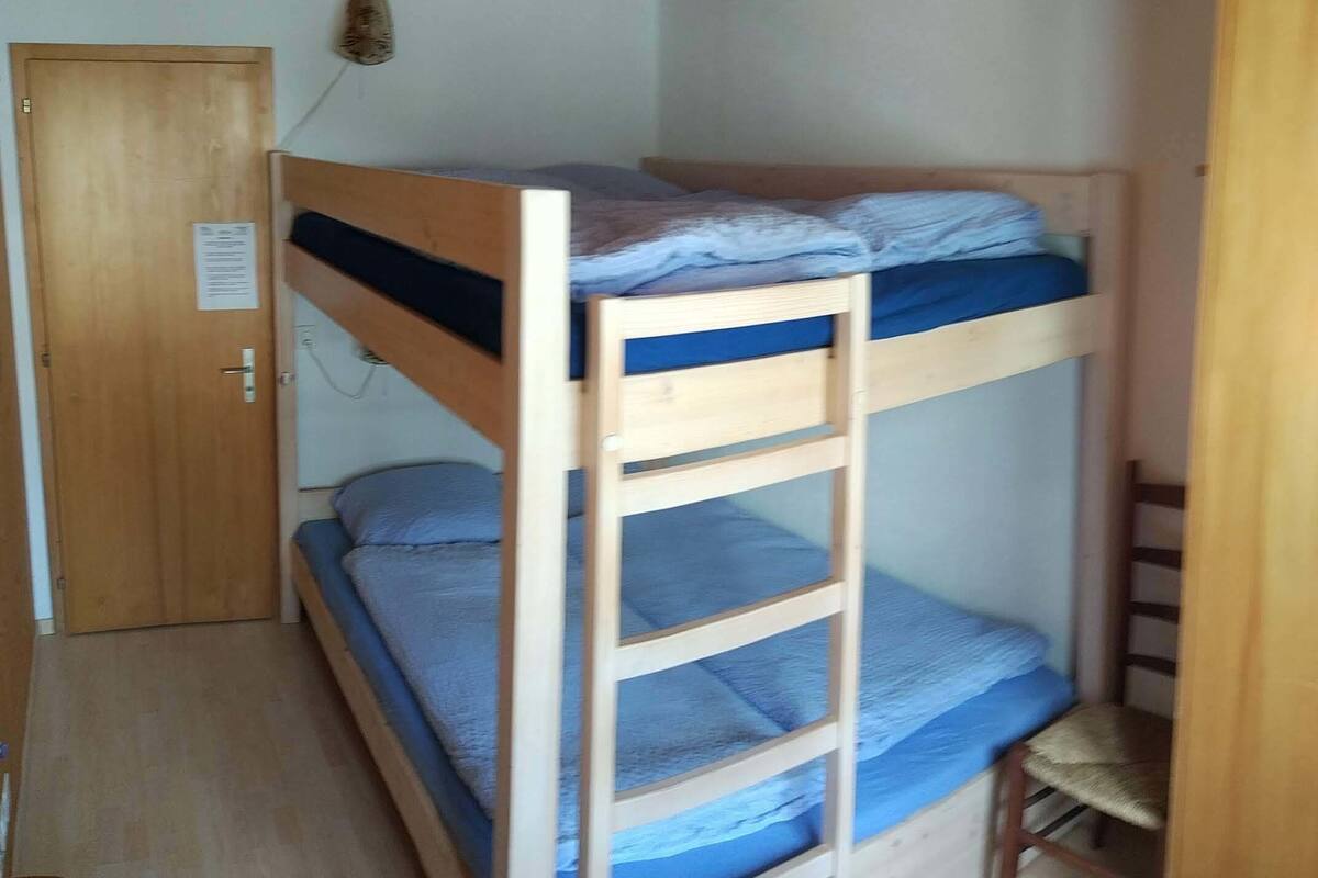 Desk, laptop workspace, free WiFi, bed sheets