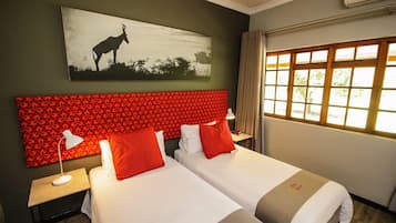 Premium bedding, individually decorated, individually furnished, desk