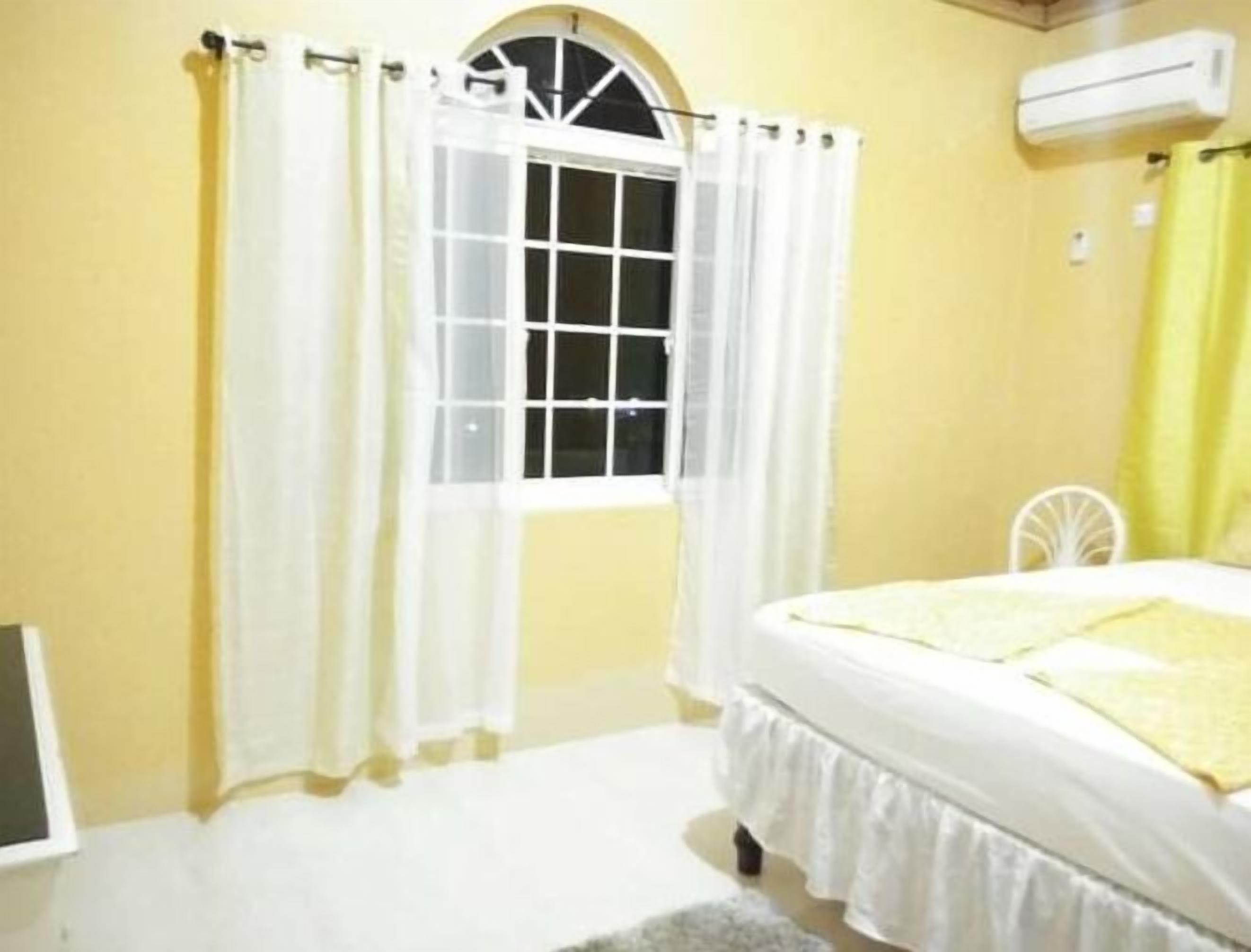 Deluxe House, Multiple Beds, Private Bathroom, Sea View | Premium bedding, individually decorated, blackout drapes