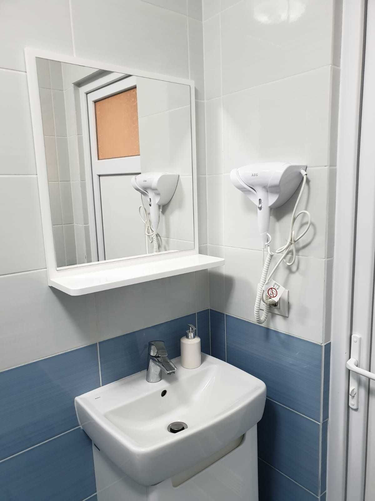 slippers, towels, toilet paper