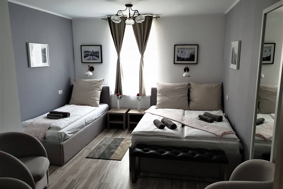 deluxe triple room | blackout curtains, soundproofing, free wifi, bed sheets