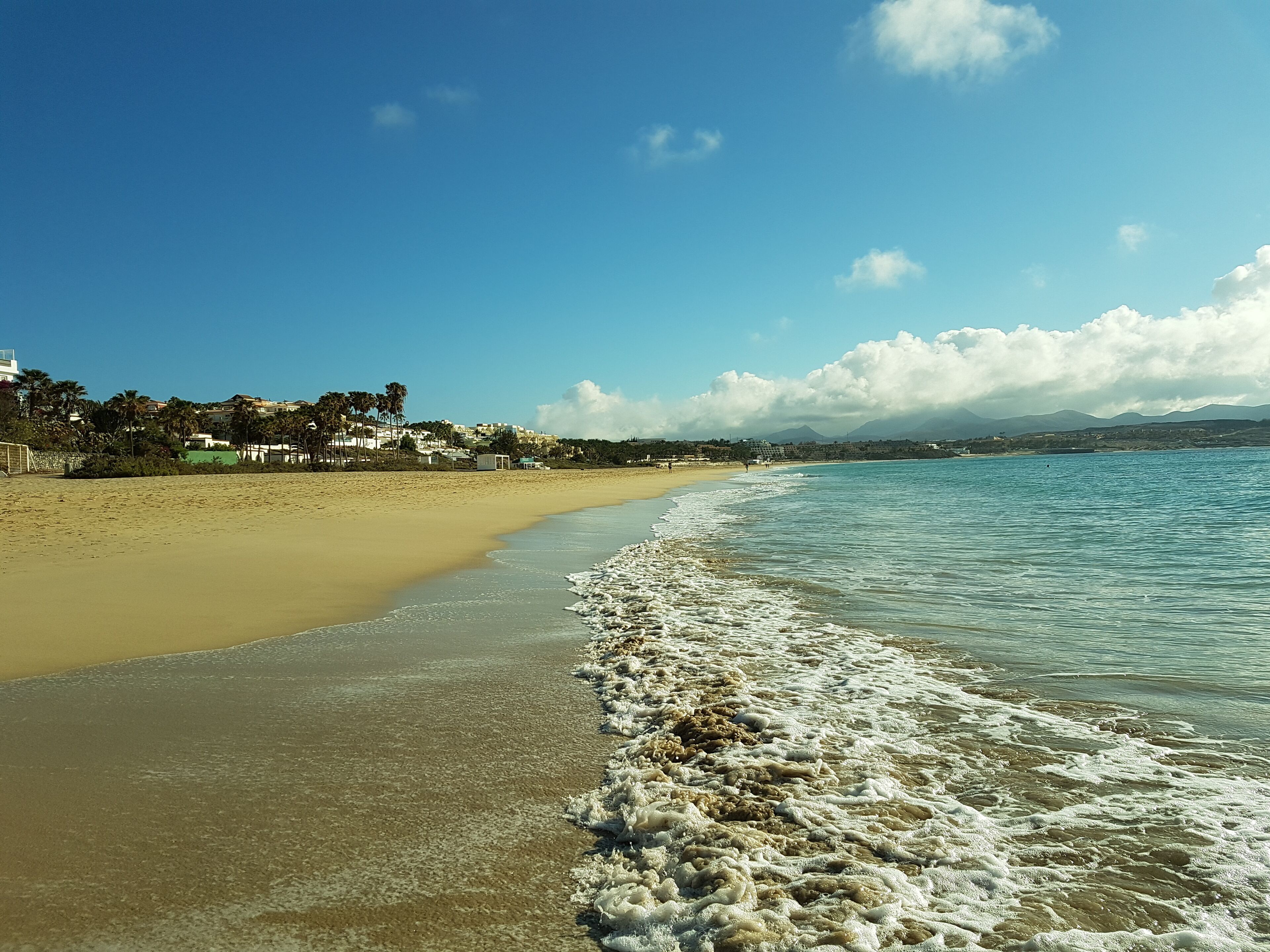 On the beach, beach towels
