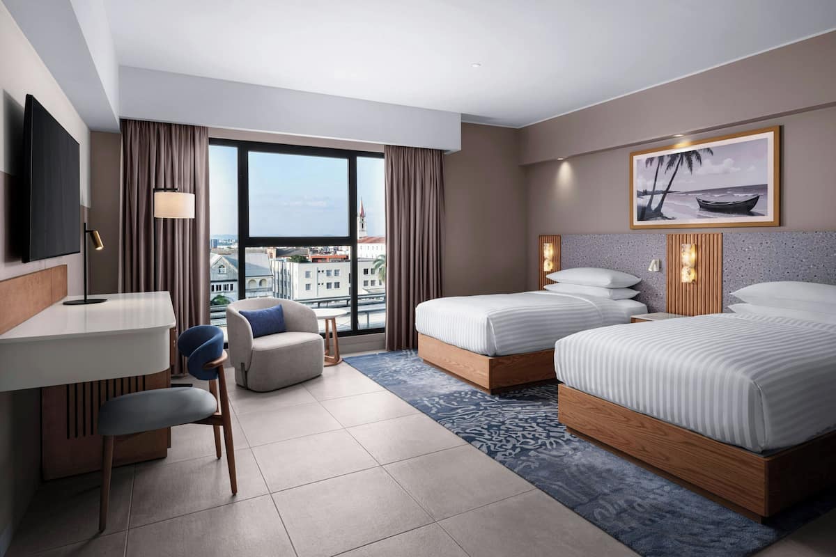 Premium bedding, down duvets, in-room safe, desk