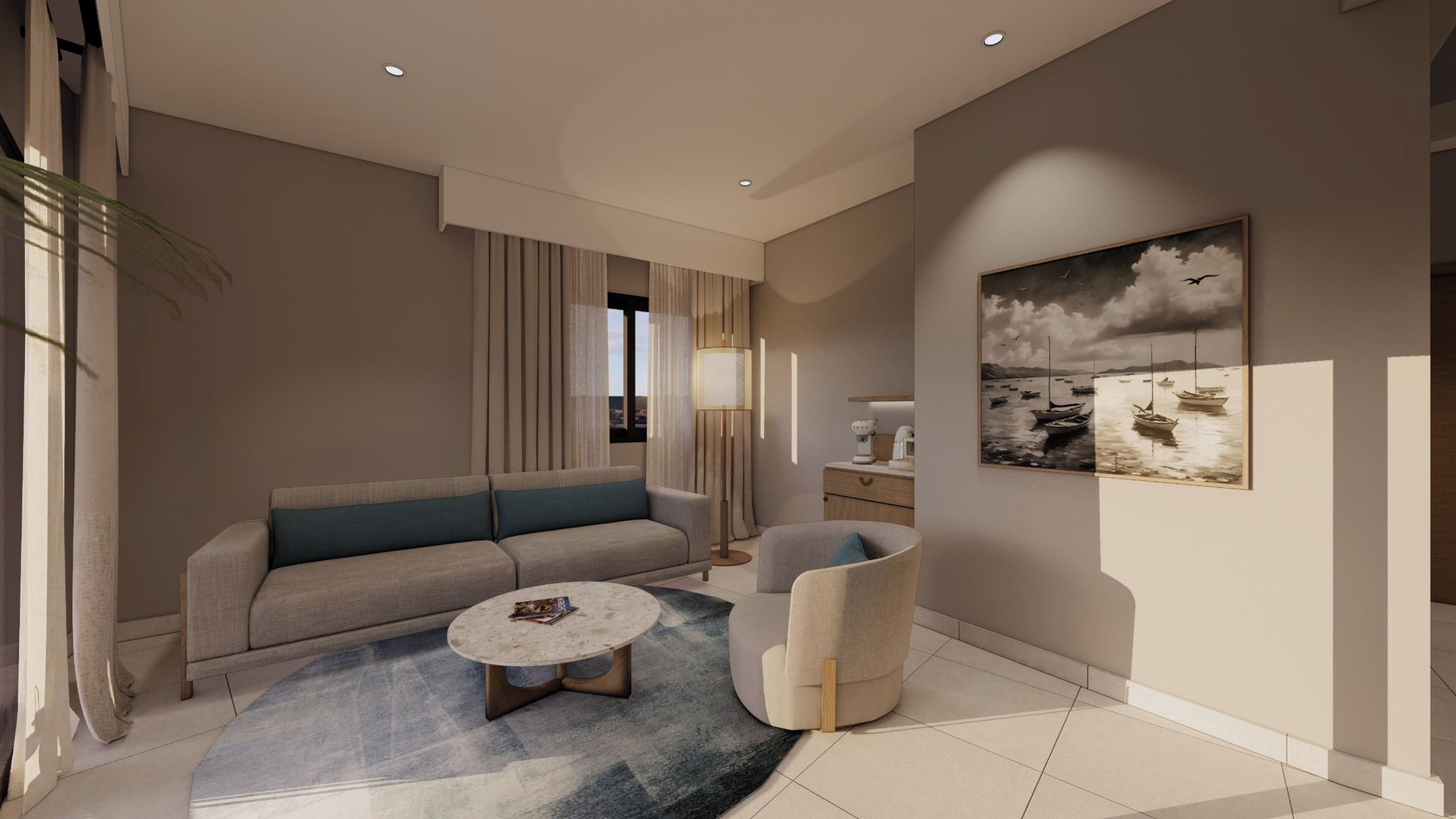 A modern living room with a sofa, armchair, coffee table, and artwork on the wall.