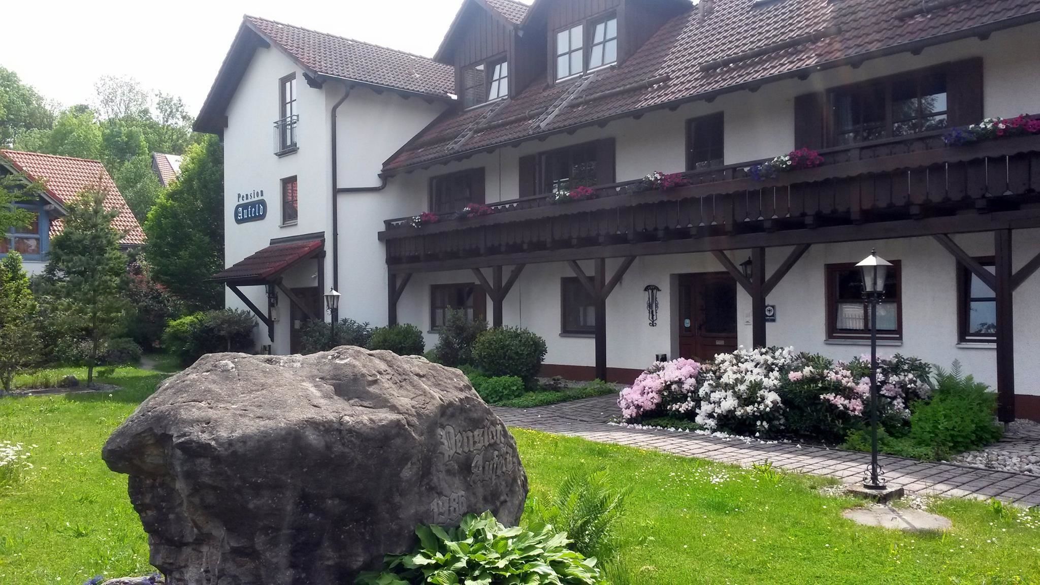 A traditional building with a sign reading "Pension Amara."
