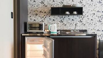 Departamento junior, 1 cama King size | Frigobar